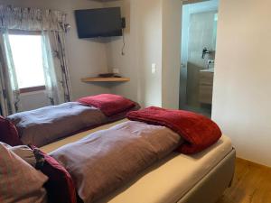 Un pat sau paturi într-o cameră la Branderhof