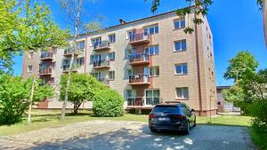 Pastatas, kuriame yra šie apartamentai