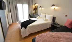 Letto o letti in una camera di King Alexander