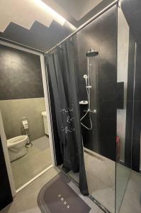 Uma casa de banho em TEPIĆ Garni Hotel