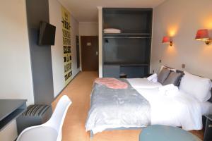Letto o letti in una camera di King Alexander