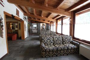 Posezení v ubytování Hotel Alpechiara