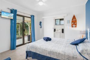 Laurelview Scenic Inn Gympie客房内的一张或多张床位