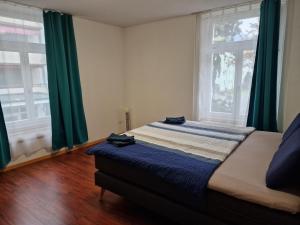 Katil atau katil-katil dalam bilik di Swiss Holidays Apartment Rosenstrasse 10