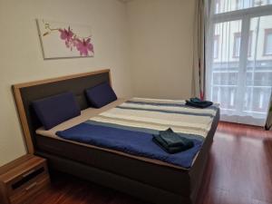 Voodi või voodid majutusasutuse Swiss Holidays Apartment Rosenstrasse 10 toas
