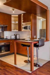 Ett kök eller pentry på San Ignacio Suite Apartments