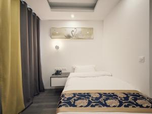 Ένα ή περισσότερα κρεβάτια σε δωμάτιο στο KYRIAD ROUEN SUD - Sotteville les Rouen
