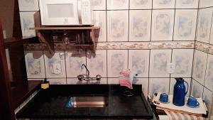 Køkken eller tekøkken på Chales Encanto Suíço + 27 billeder