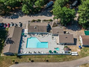 an aerial view of a house with a swimming pool at Moody Beach Camping Resort Loft Park Model 14 in Moody