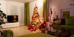 TV a/nebo společenská místnost v ubytování Garden Apartments Janša + 62 fotografií