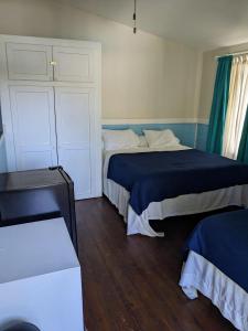 Un ou plusieurs lits dans un hébergement de l'établissement Coral Beach Village Resort