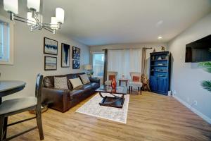 a living room with a couch and a table at Cozy 2 Bedroom Townhouse in Northgate in Seattle