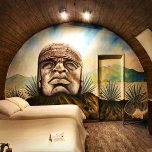 Una cama o camas en una habitación de Matices Hotel de Barricas