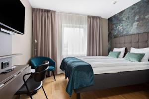TV a/nebo společenská místnost v ubytování Best Western Hotel Vidöstern