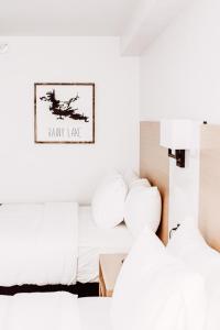 Postel nebo postele na pokoji v ubytování La Place Rendez-Vous Hotel