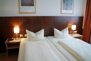 Cama ou camas em um quarto em Hotel Italia
