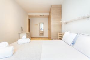 A bed or beds in a room at Casa 20 minutos de Barcelona y WIFI alta capacidad