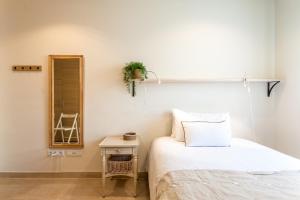 A bed or beds in a room at Casa 20 minutos de Barcelona y WIFI alta capacidad