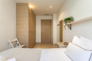 A bed or beds in a room at Casa 20 minutos de Barcelona y WIFI alta capacidad