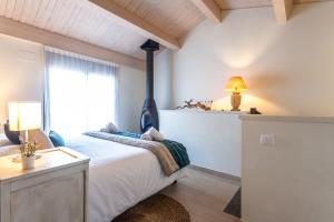 A bed or beds in a room at Casa 20 minutos de Barcelona y WIFI alta capacidad