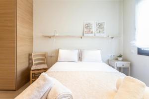 A bed or beds in a room at Casa 20 minutos de Barcelona y WIFI alta capacidad
