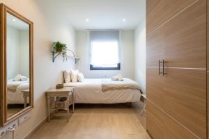 A bed or beds in a room at Casa 20 minutos de Barcelona y WIFI alta capacidad