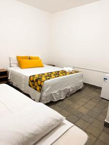 Een bed of bedden in een kamer bij Beach Point Barra Grande