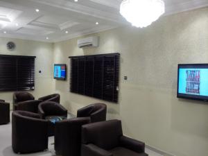A television and/or entertainment centre at Haute Aparthotel