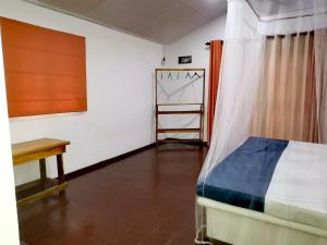Letto o letti in una camera di Helios Beach Resort