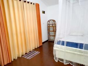 Letto o letti in una camera di Helios Beach Resort