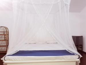 Letto o letti in una camera di Helios Beach Resort