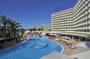a large swimming pool in front of a hotel at Sol Guadalupe in Magaluf
