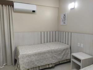 1 dormitorio pequeño con 2 camas y calentador en Spazzio Diroma Acqua e Splash Caldas novas, GRATIS PARK, en Caldas Novas 77 fotos más