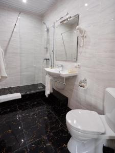 Ванная комната в Центр Отель