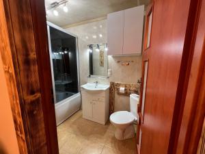 Kúpeľňa v ubytovaní Apartamenty i Domki Taterka