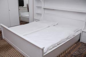 En eller flere senge i et værelse på Diana’s Apartment
