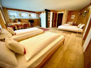 En eller flere senge i et værelse på Camera 4 letti +ang cucina/bagno all'interno Villa