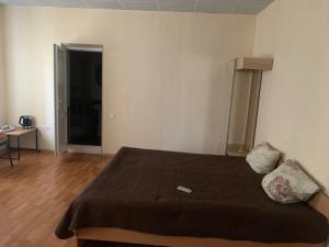 Postel nebo postele na pokoji v ubytování Apartment on Mira avenue