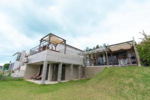 a house being built on top of a hill at -Musée Villa- in Nakijin