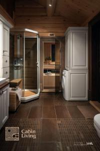 Et badeværelse på Luxury Cabin at Nesfjellet with sauna, bbq, close to ski & golf