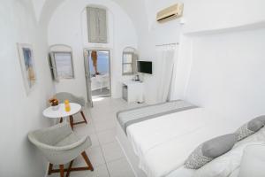 Φωτογραφία από το άλμπουμ του Vogue Suites στην Οία