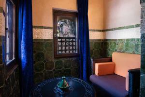 Χώρος καθιστικού στο Hôtel Riad Dar Daïf