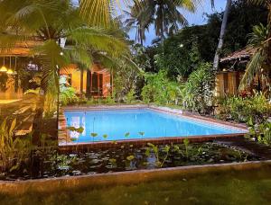 Kolam renang di atau di dekat LAGI FARMSTAY