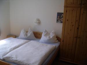 Een bed of bedden in een kamer bij Pension Post - Sistrans