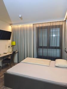 Voodi või voodid majutusasutuse Hotel Eulensteins toas