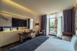 Кровать или кровати в номере IC Hotels Airport