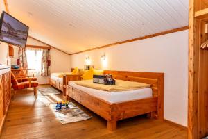Posteľ alebo postele v izbe v ubytovaní Ferienwohnung am Baby & Kinderbauerhof Stefflhof