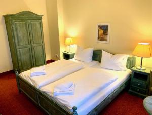 Postel nebo postele na pokoji v ubytování Hotel See-Eck
