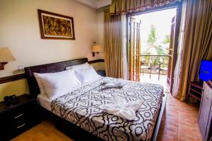 Un ou plusieurs lits dans un hébergement de l'établissement Grand Luis Mountain Resort