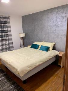 Postel nebo postele na pokoji v ubytování Apartman Ninkovic